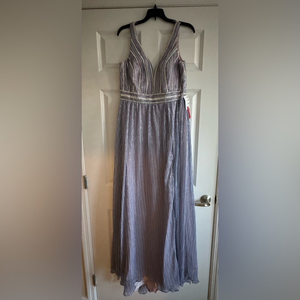 Perfect for prom! 
NWT Ieena for Mac Duggal Plunge Neck Metallic Stripe Gown